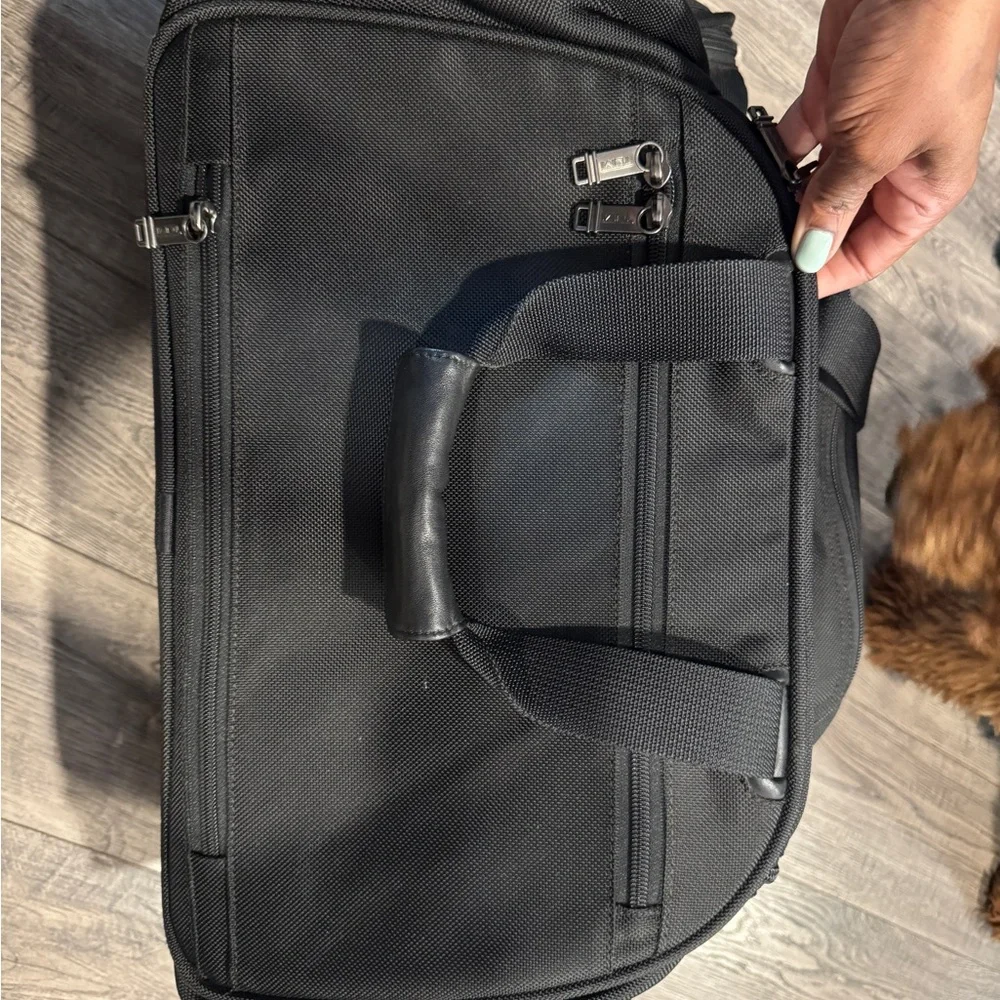 Tumi Black Duffel Bag with Durable Design